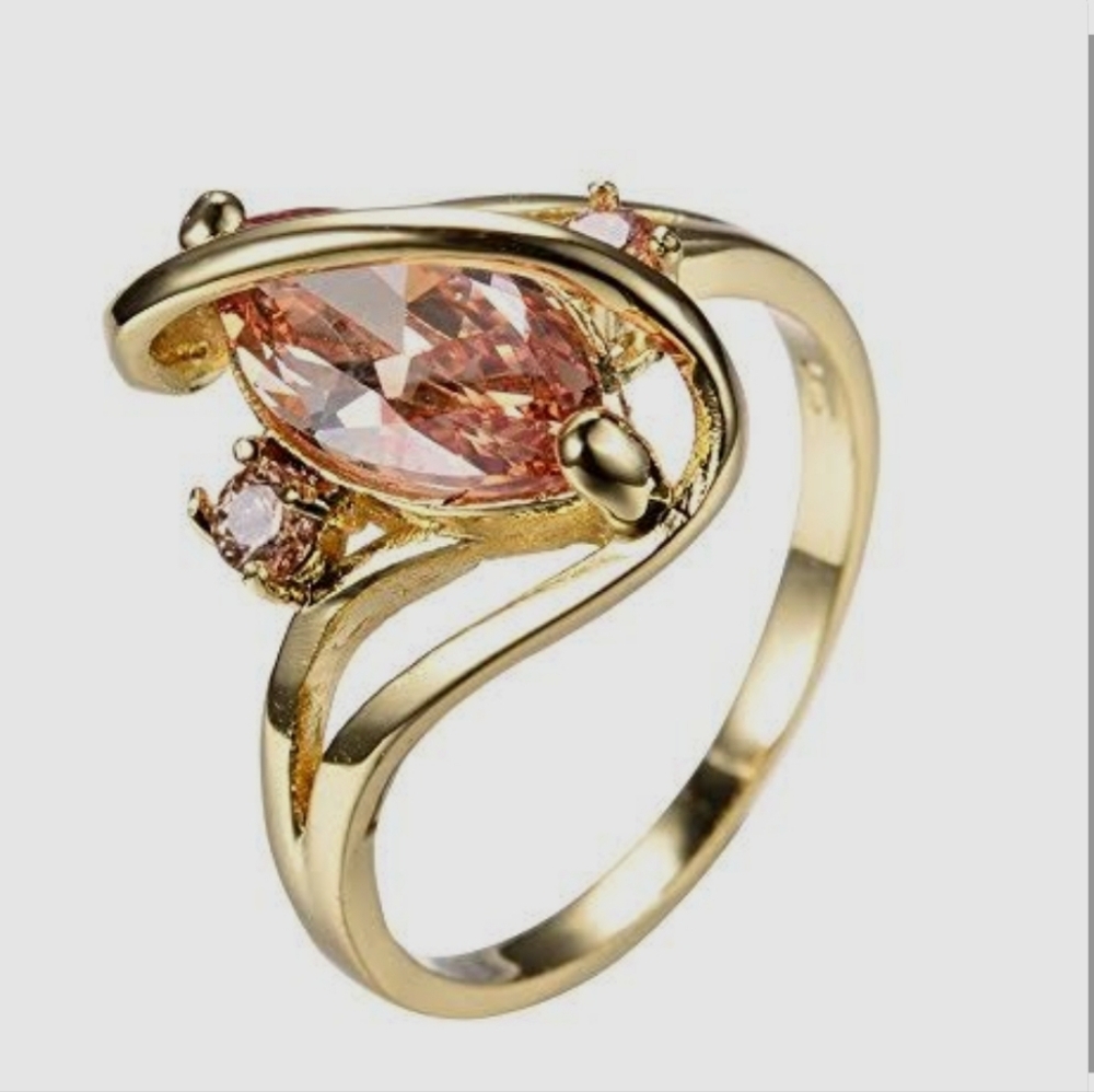 New Marquise Cut Pink Sapphire Gold Ribbon Ring.